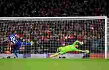 David Raya of Arsenal saves the second penalty from Wendell of FC Porto in the penalty shoot out during the UEFA Champions League 2023/24 round of ...