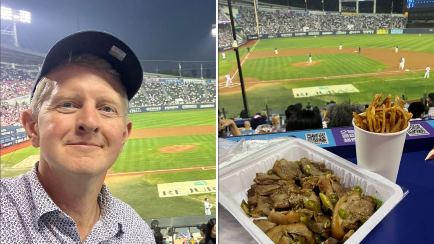 Ken Jennings at a baseball game in South Korea while eating pig's feet