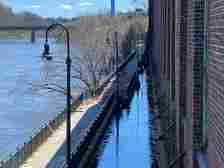 The newly opened Riverwalk between Boott Mills and the Lowell...