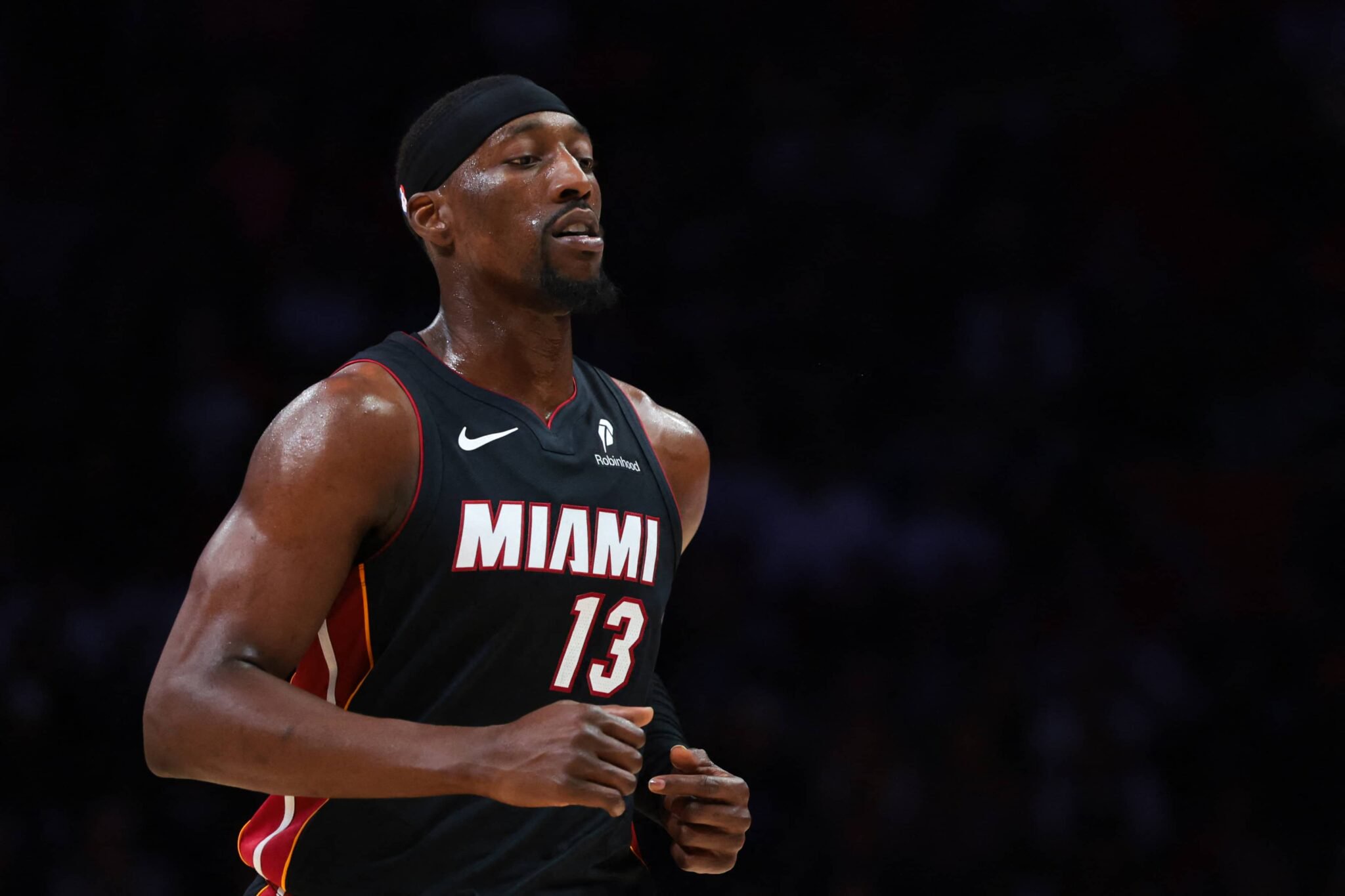 Miami, Florida, USA; Miami Heat center Bam Adebayo (13) looks on against the Brooklyn Nets during the third quarter at Kaseya Center. Mandatory Credit: Sam Navarro-Imagn Images