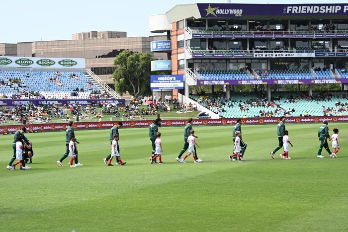 The Proteas walk out to sing the national anthem with plenty of empty blue seats greeting them ahead of the first ODI against Australia at Kingsmead on Thursday.