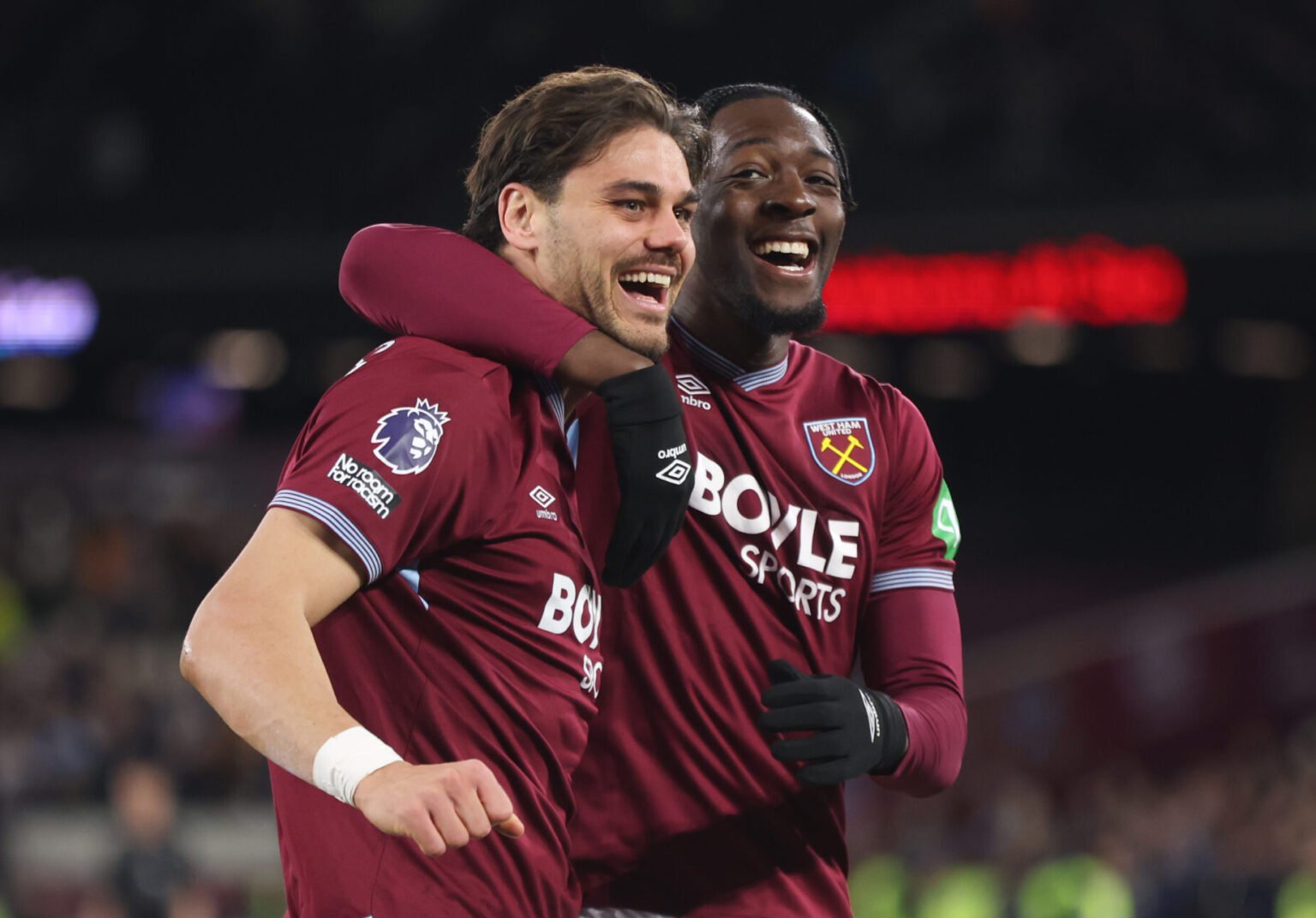 Konstantinos Mavropanos celebrates scoring his side's fourth goal with Axel Disasi - West Ham United v Wolverhampton Wanderers - Premier League