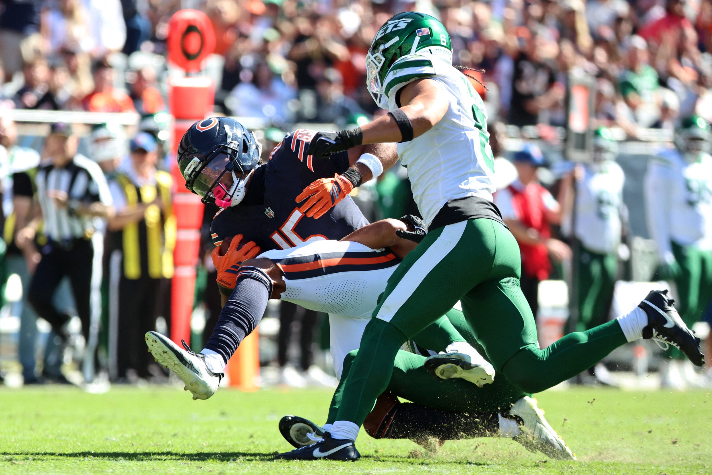 Oct 4, 2026; Chicago, Illinois, USA;  New York Jets safety Minkah Fitzpatrick (29) tackles Chicago Bears wide receiver Rome Odunze (15) during the second quarter at Soldier Field.  Mandatory Credit: Mike Dinovo-Imagn Images