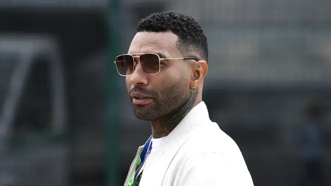 Jermaine Pennant looks on in the pitlane prior to the F1 Grand Prix of Great Britain at Silverstone on July 03, 2022 in Northampton, England.