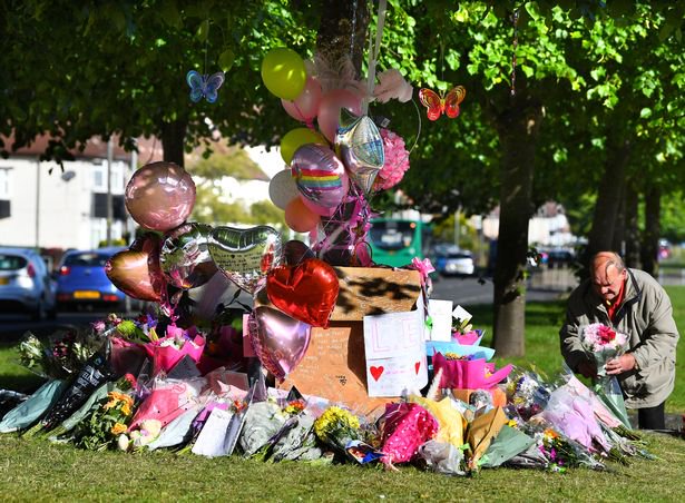 Teddy bears, flowers and handwritten tributes have been left for a girl who died after being hit by a van