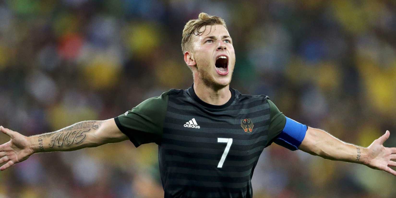 Max Meyer celebrates scoring for Germany