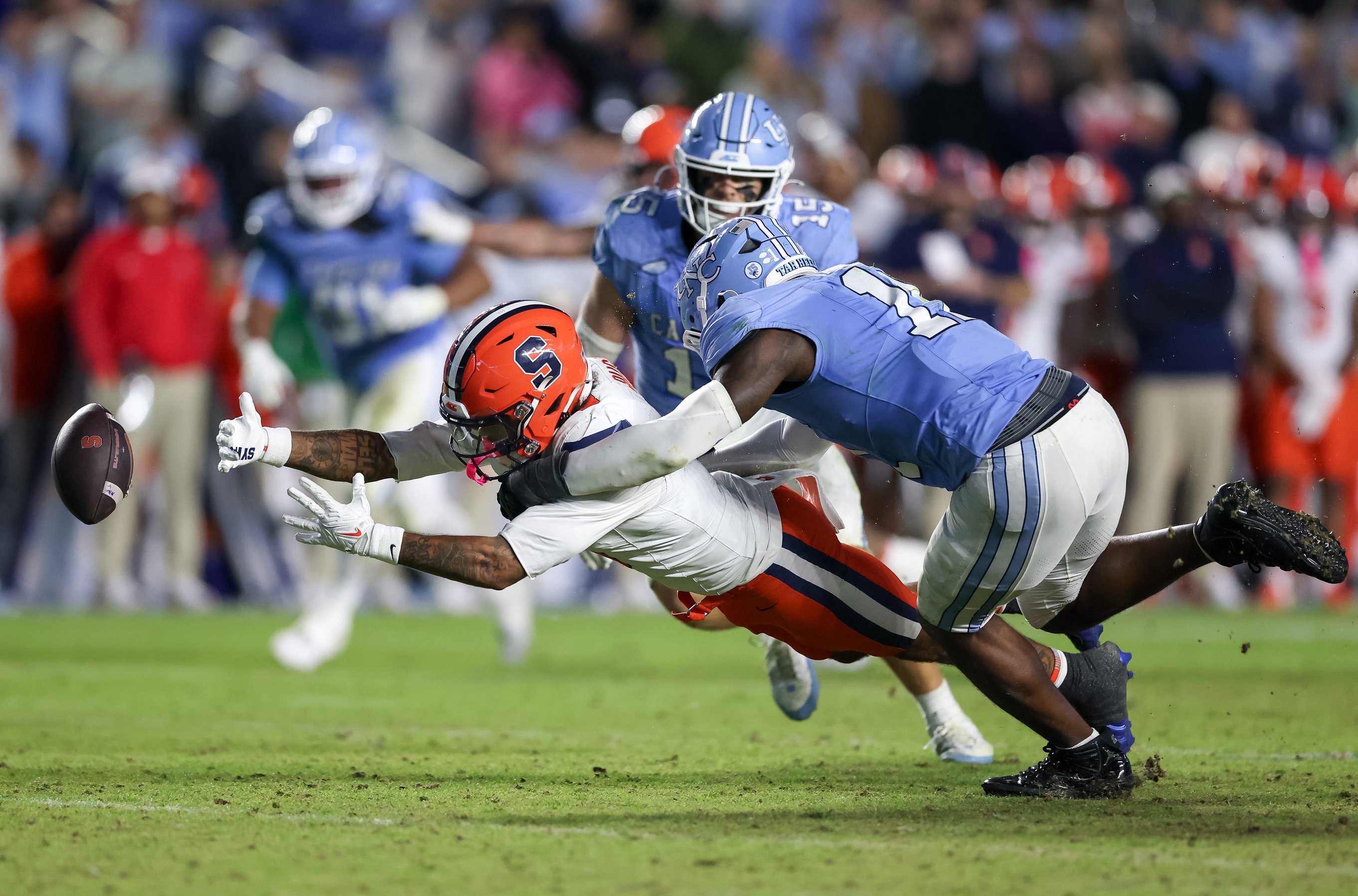 Oct 24, 2026; Chapel Hill, North Carolina, USA;  Syracuse Orange wide receiver Tyshawn Russell (8) dives for the ball during the fourth quarter against North Carolina Tar Heels at Kenan Stadium.  Mandatory Credit: Cory Knowlton-Imagn Images