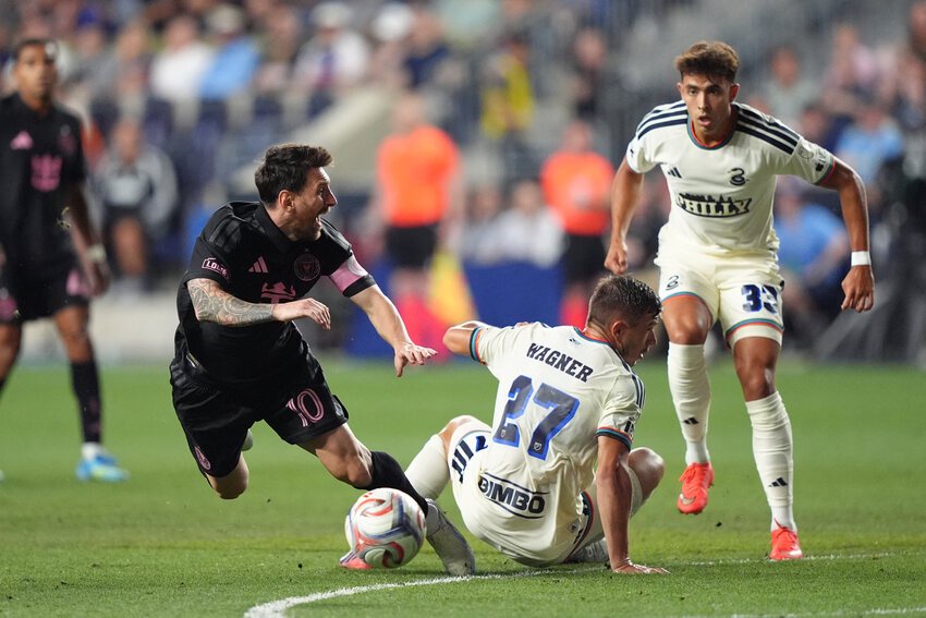 Inter Miami CF forward Lionel Messi (10) collides with Philadelphia Union defender Kai Wagner (27) in the second half at Subaru Park.