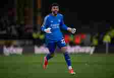 Arsenal goalkeeper David Raya celebrates after his team's first goal during the Premier League match between Wolverhampton Wanderers and Arsenal FC at Molineux.