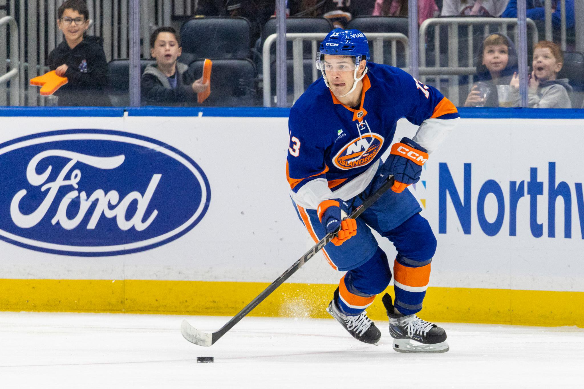 New York Islanders center Mathew Barzal skates with the puck during a game against the Washington Capitals.