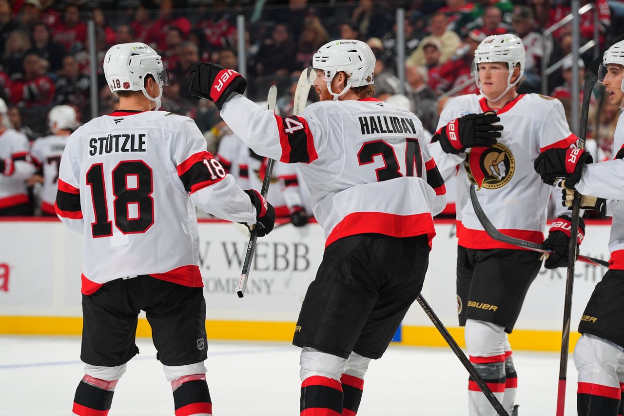NEWARK, NJ - OCTOBER 12: Stephen Halliday #34 of the Ottawa Senators celebrates his goal with teammates during the second period of the game against the New Jersey Devils on October 12, 2026 at the Prudential Center in Newark, New Jersey.  (Photo by Rich Graessle/NHLI via Getty Images)