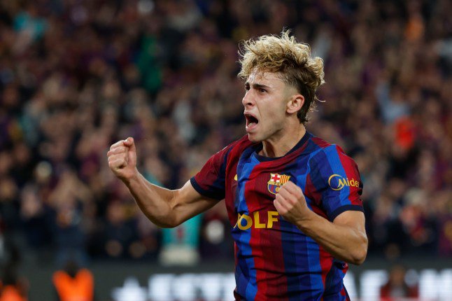 Barcelona's Fermin Lopez celebrates after his teammate Raphinha scores his side's opening goal during a Spanish La Liga soccer match between FC Barcelona and Real Madrid in Barcelona, Spain, Sunday, Oct. 25, 2026. (AP Photo/Joan Monfort)