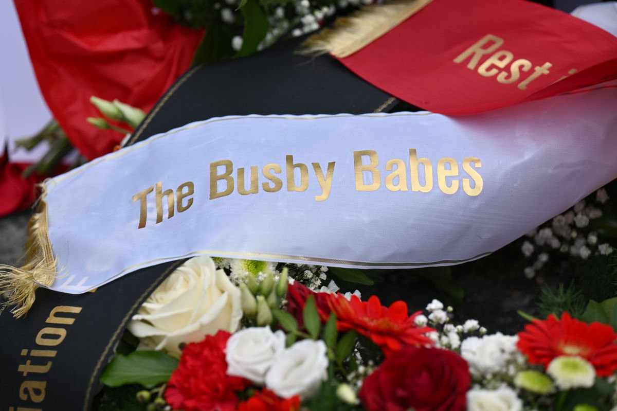 Detail shot of a wreath with the words "The Busby Babes" and "Rest in Peace" is seen after the commemoration for the 68th Anniversary of the Munich Air Disaster at the Manchesterplatz Memorial on February 06, 2026