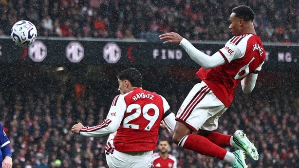 Arsenal's Brazilian defender #06 Gabriel Magalhaes (R) heads home their second goal during the English Premier League football match between Arsenal and Everton at the Emirates Stadium in London on October 24, 2026. (Photo by Henry Nicholls / AFP) / RESTRICTED TO EDITORIAL USE. No use with unauthori