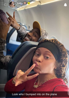 Singer Davido and American Singer Latto Spotted on Commercial Flight
