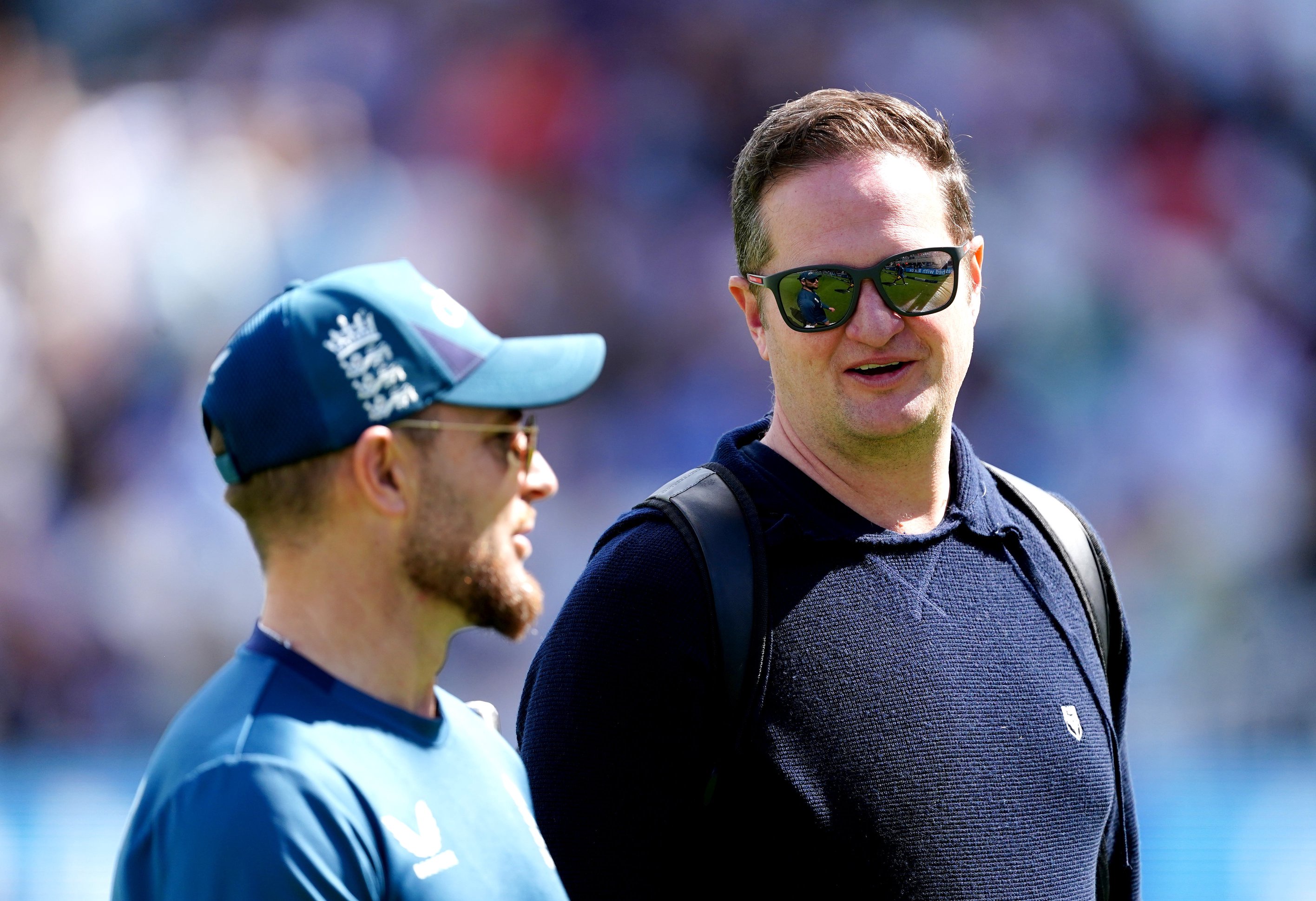 England managing director Rob Key (right) speaks to head coach Brendon McCullum