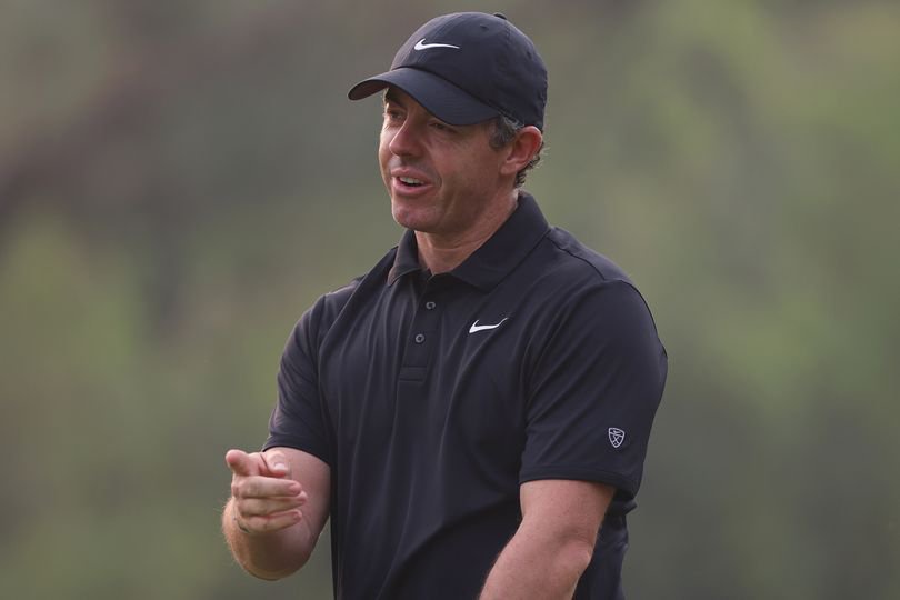 Rory McIlroy looks on