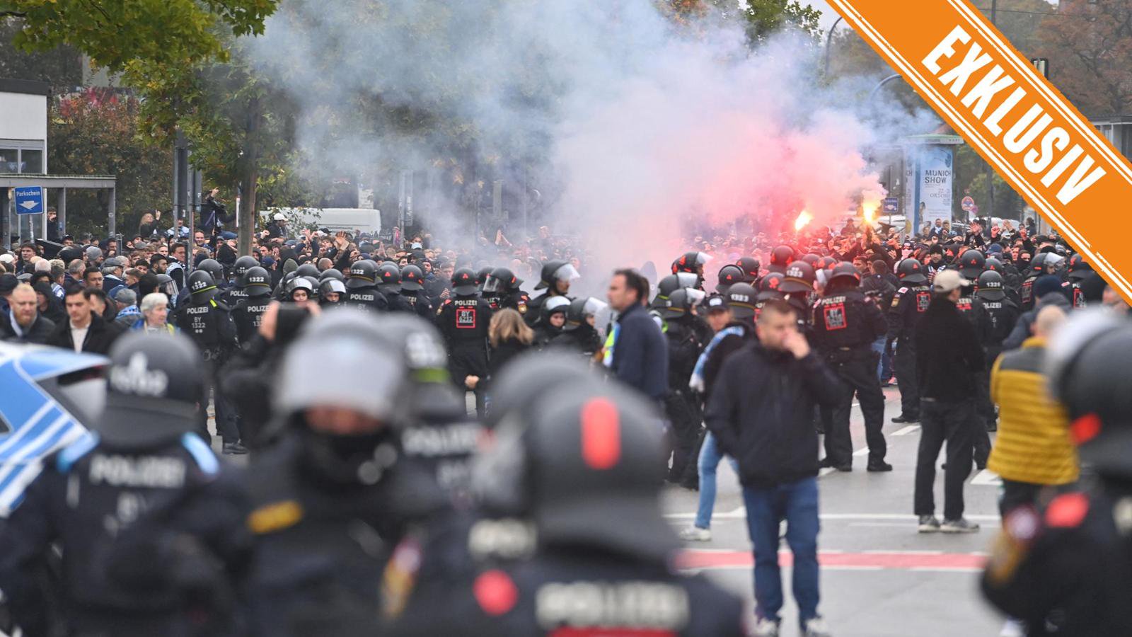 1860- und Bayern-Fans mit der Polizei
