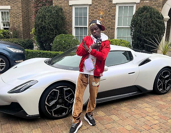Portable In London : Singer Gets N1.5m Cash Gift From Pastor Tobi, Poses With His Rolls-Royce, Lamborghini, Maserati - autojosh 