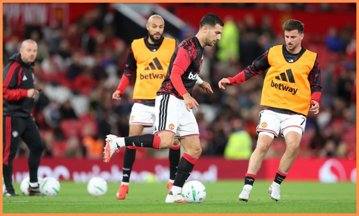 Diogo Dalot warming up for Manchester United