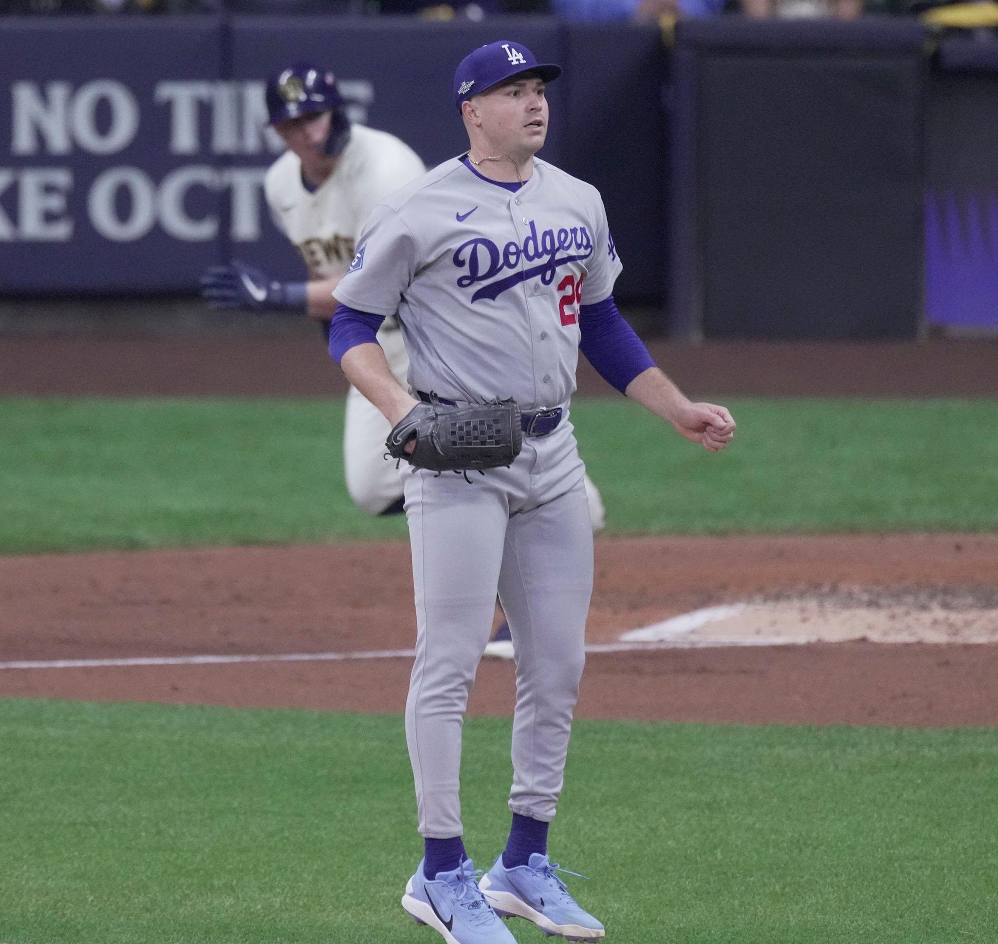 Los Angeles Dodgers pitcher Tarik Skubal watches a double by Milwaukee Brewers first baseman Andrew Vaughn.