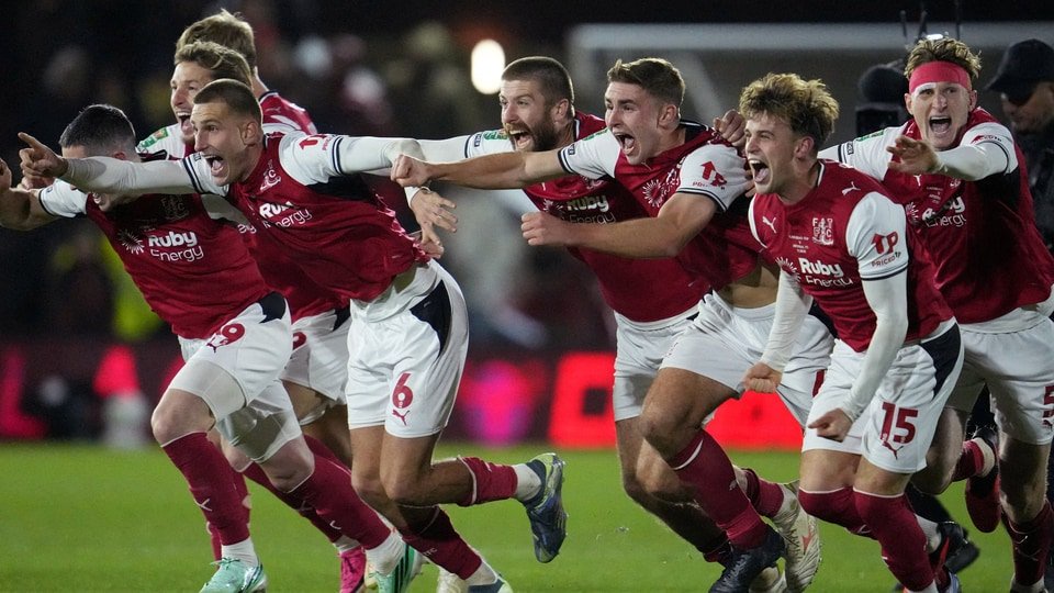 Fleetwood Town players celebrate winning the penalty shootout. (REUTERS)
