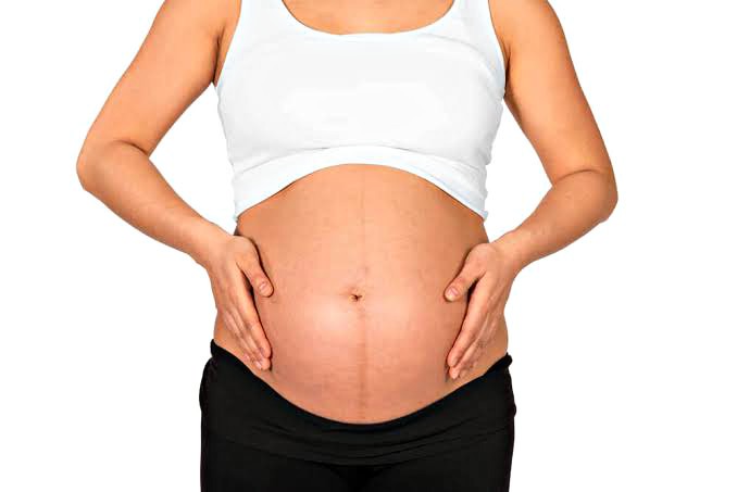 Here Is What The Dark Straight Line On A Pregnant Womans Stomach Mean