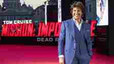 Tom Cruise walks red carpet at Mission Impossible premiere