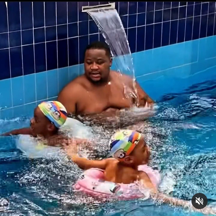 "Biggy And Sons" - Young Billionaire, Cubana Chief Priest Says As He Was Swimming With His Children B8e0ee3b2f7a45dfb60b21aa92c746dd?quality=uhq&format=webp&resize=720