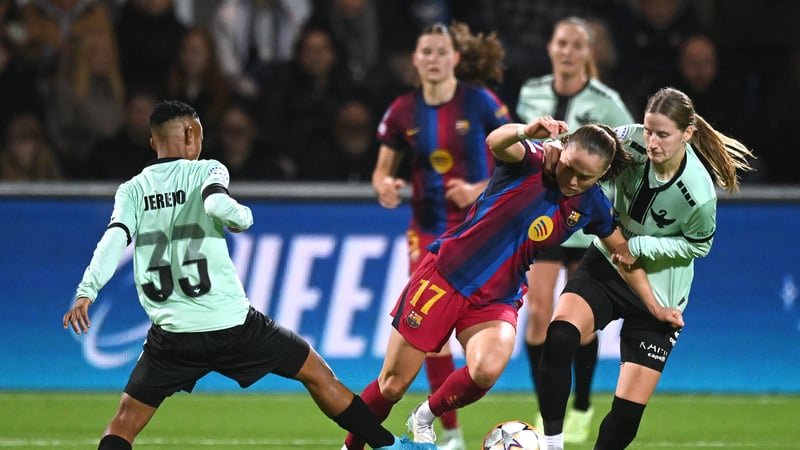 Ewa Pajor of FC Barcelona is tackled by Mwanalima Jereko of HB Koge during the UEFA Women's Champions League 2026/27 League Phase MD3 match between HB Koge Women and FC Barcelona at Koge Stadion on October 29, 2026 in Koge, Denmark.