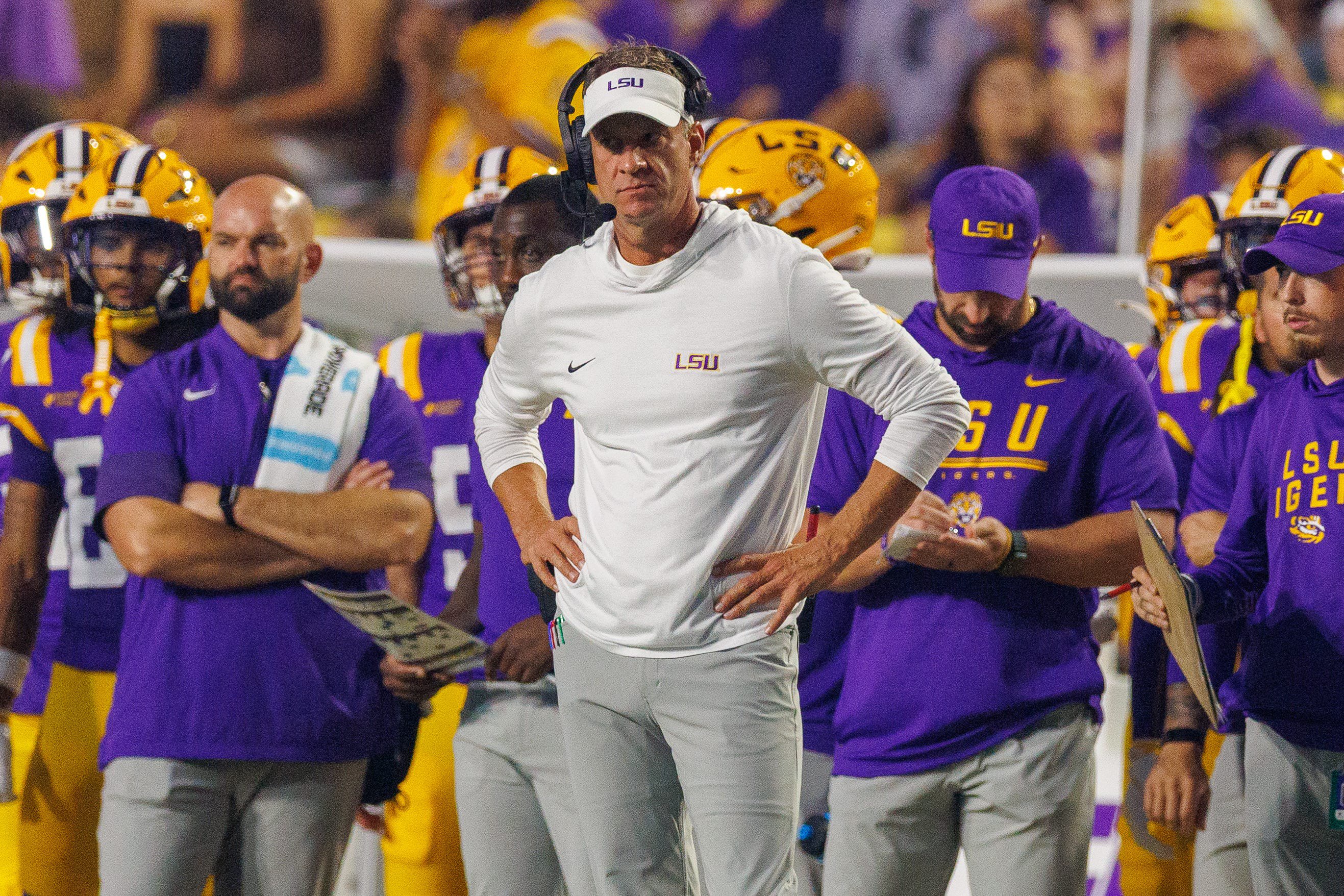 Oct 3, 2026; Baton Rouge, Louisiana, USA;  LSU Tigers head coach Lane Kiffin looks on against the McNeese Cowboys during the first half at Tiger Stadium.  Mandatory Credit: Stephen Lew-Imagn Images
