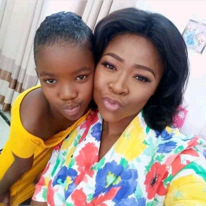 Pictures of Actress Portia Asare and her two kids surfaces online 4