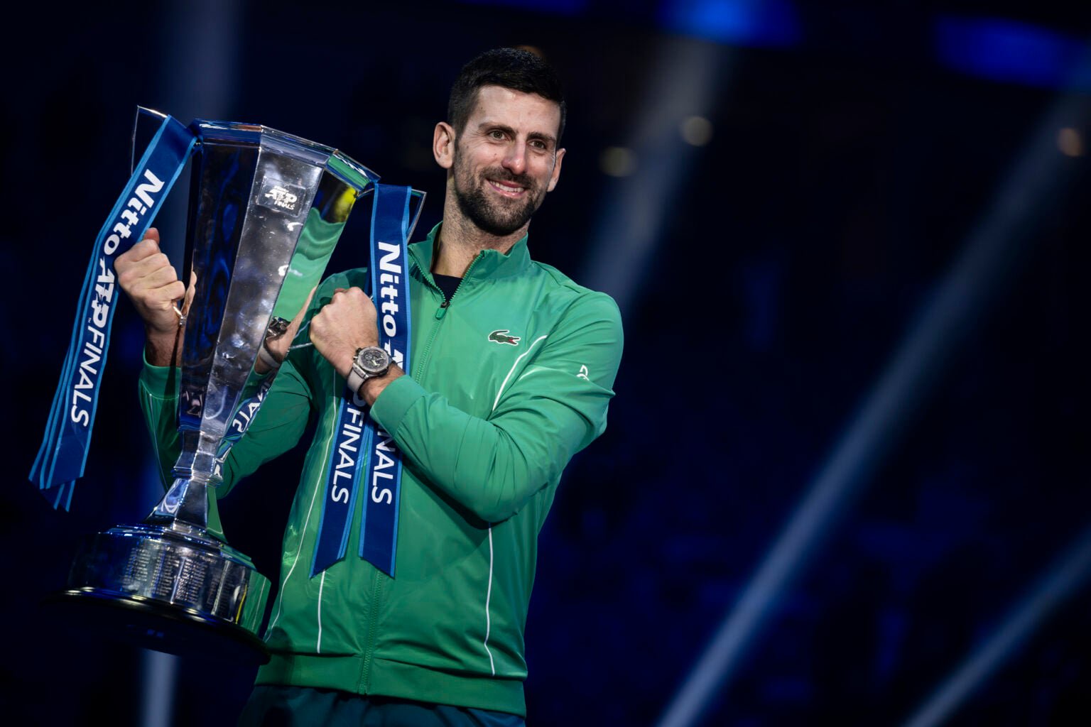 Novak Djokovic of Serbia holds the ATP Finals trophy