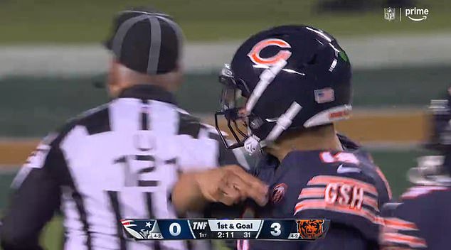 QB Caleb Williams tried calling Burden back to the huddle to no avail, leading to a timeout