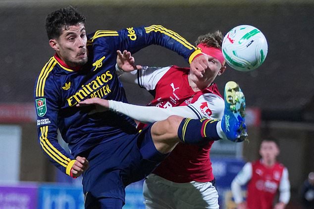 Arsenal's Kai Havertz, left, challenges for the ball with Fleetwood's Finley Potter during the English League Cup soccer match between Fleetwood Town and Arsenal in Fleetwood, England, Tuesday, Oct. 27, 2026. (AP Photo/Ian Hodgson)