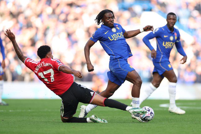 Manchester United's Andrey Santos, left, tackles Chelsea's Romeo Lavia during the English Premier League soccer match between Chelsea and Manchester United in London, Saturday, Oct. 31, 2026. (AP Photo/Ian Walton)