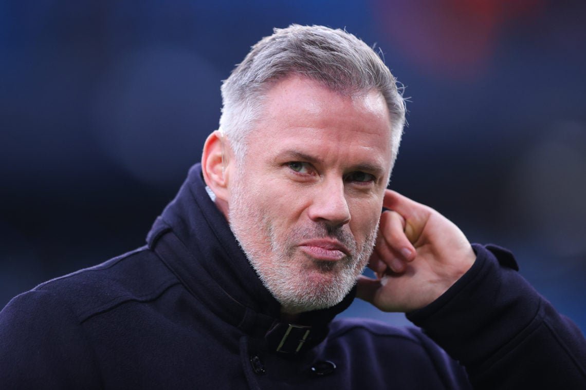 Jamie Carragher looking on while working as a pundit before a game