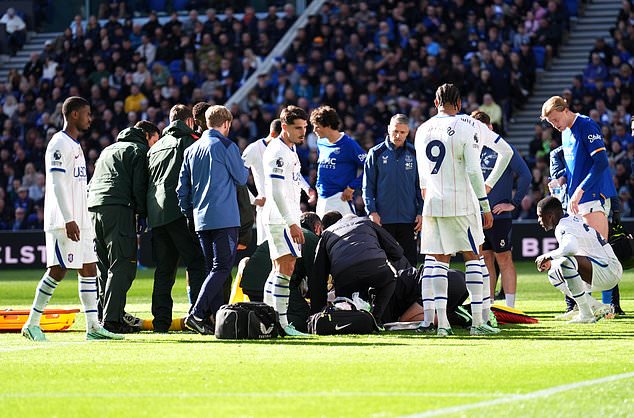 Chelsea goalkeeper Emiliano Martinez received treatment after a head clash at Everton (Mike Egerton/PA)