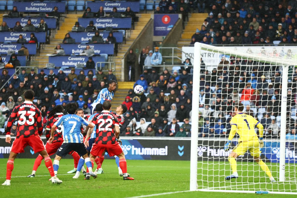 Stephen Mfuni of Coventry City heads towards goal
