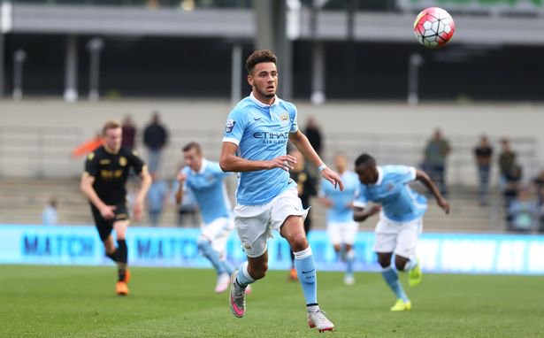Manchester City's David Faupala runs after the ball during their Manchester Senior Cup Final against Bolton Wanderers