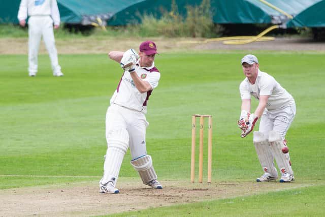 Greg Keywood hit an unbeaten 29 and took three wickets in Scholes' victory over Crossbank Methodists that kept them a point clear at the top of the Bradford League's Division Three.