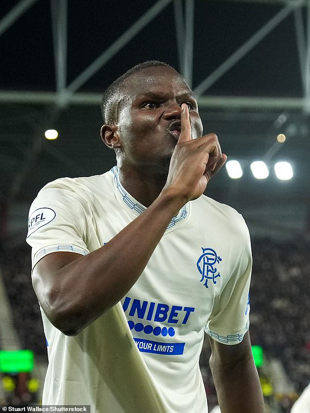 Rangers defender Olwethu Makhanya celebrates his leveller by shushing the Tynecastle crowd
