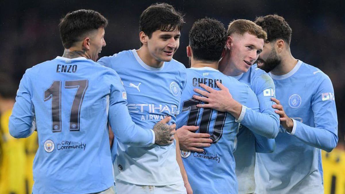 Manchester City players celebrate against AEK Athens