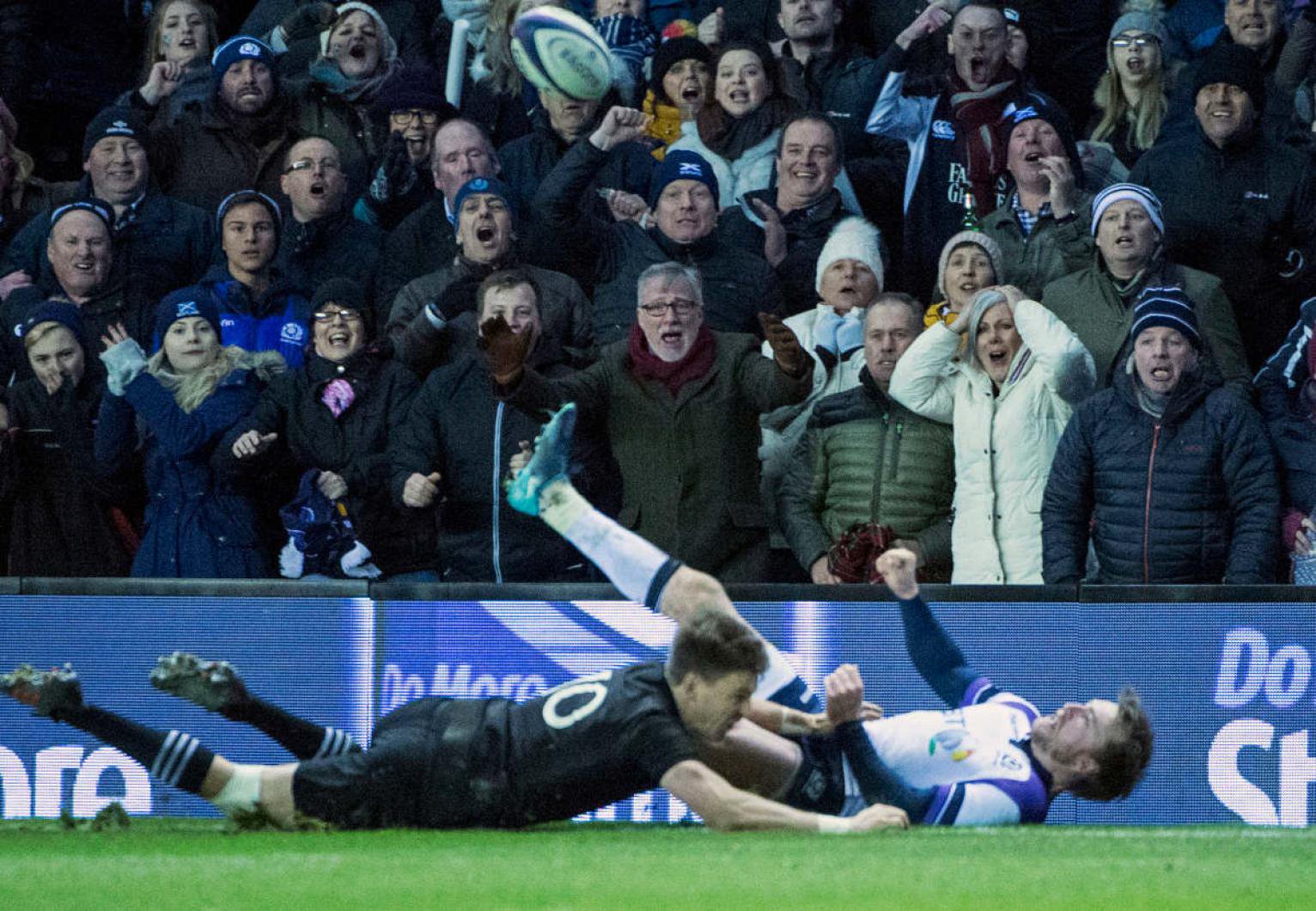 Stuart Hogg loses the ball after Beauden Barrett's tackle in 2017