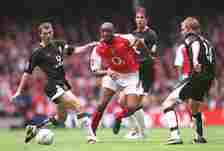 Patrick Vieira of Arsenal passes the ball under pressure from Roy Keane of Man Utd during the FA Cup Final match between Arsenal and Manchester Uni...