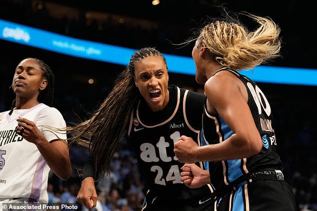 Atlanta Dream forward Brionna Jones (24) and Atlanta Dream guard Rhyne Howard (10) react after a foul during the second half of Game 3 of the WNBA basketball finals against the Golden State Valkyries on Wednesday, Oct. 21, 2026, in Atlanta. (AP Photo/Brynn Anderson)
