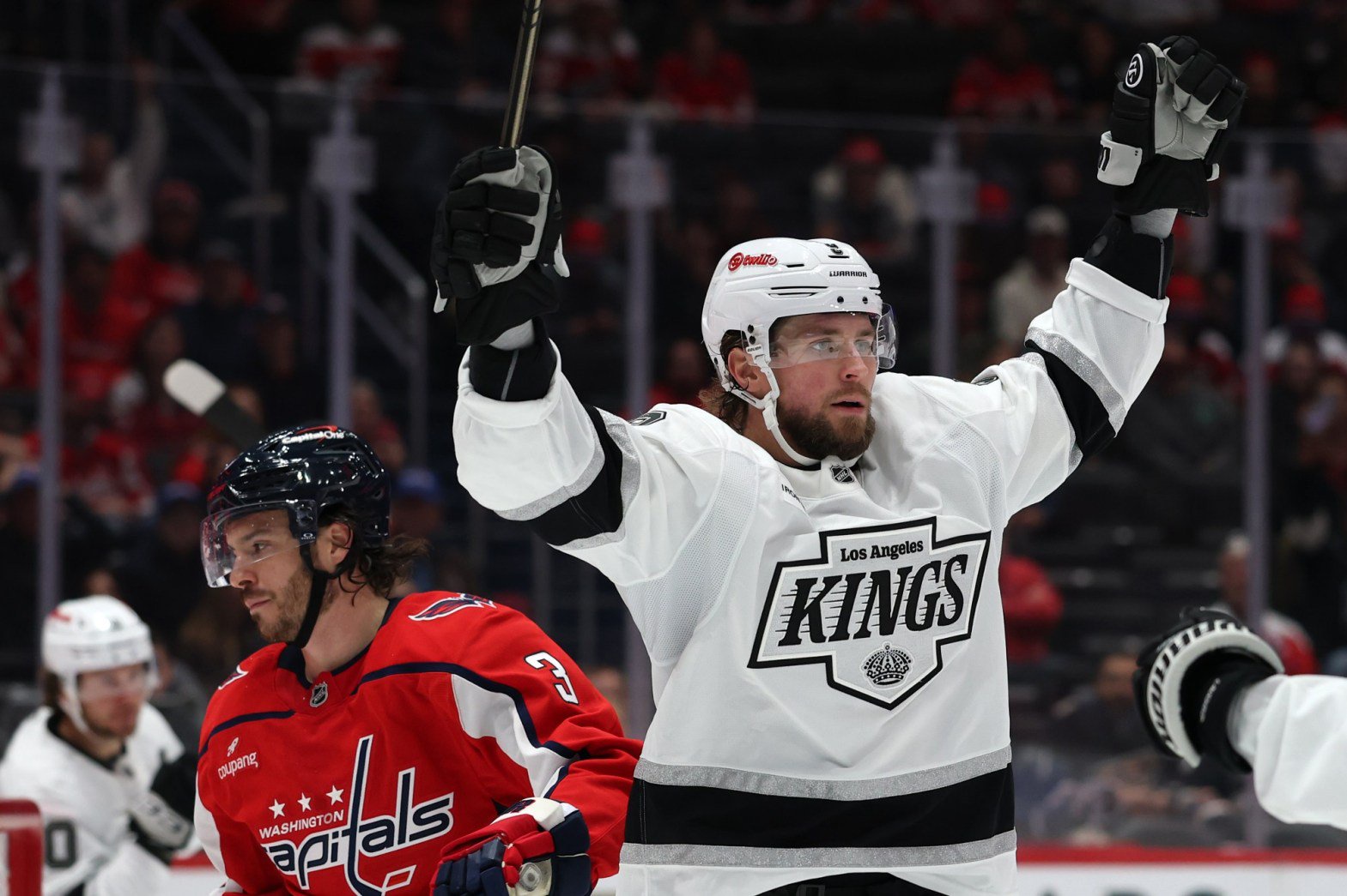 The Kings’ Adrian Kempe celebrates after scoring a goal during the third period of their 5-2 comeback win against the Washington Capitals on Tuesday night in Washington, D.C. Kempe scored two goals in the team’s first win of the season. (Photo by Patrick Smith/Getty Images)
