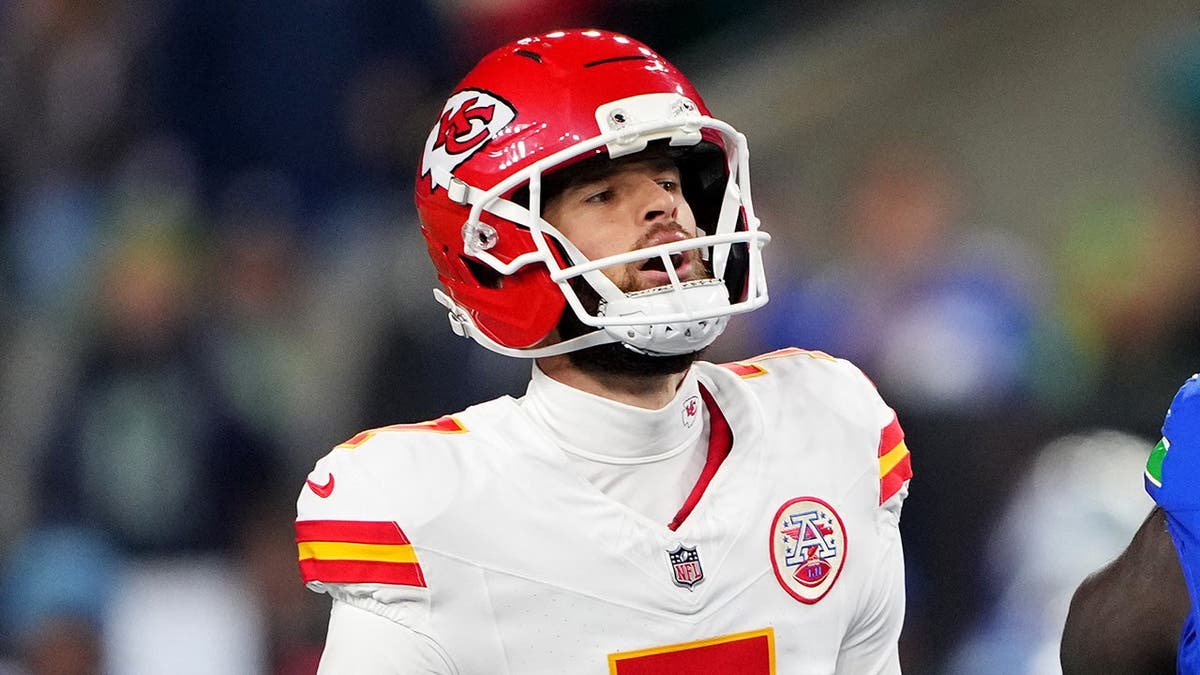 Harrison Butker reacts after missing a field goal attempt during an NFL game in Seattle.