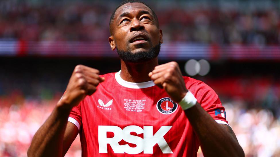 Chuks Aneke in red Charlton shirt does a double fist pump