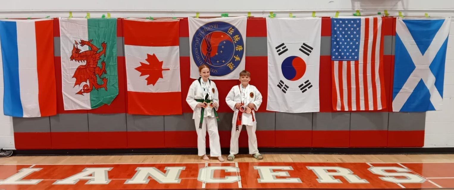 Lexi and Christian Bruce with their medal haul.